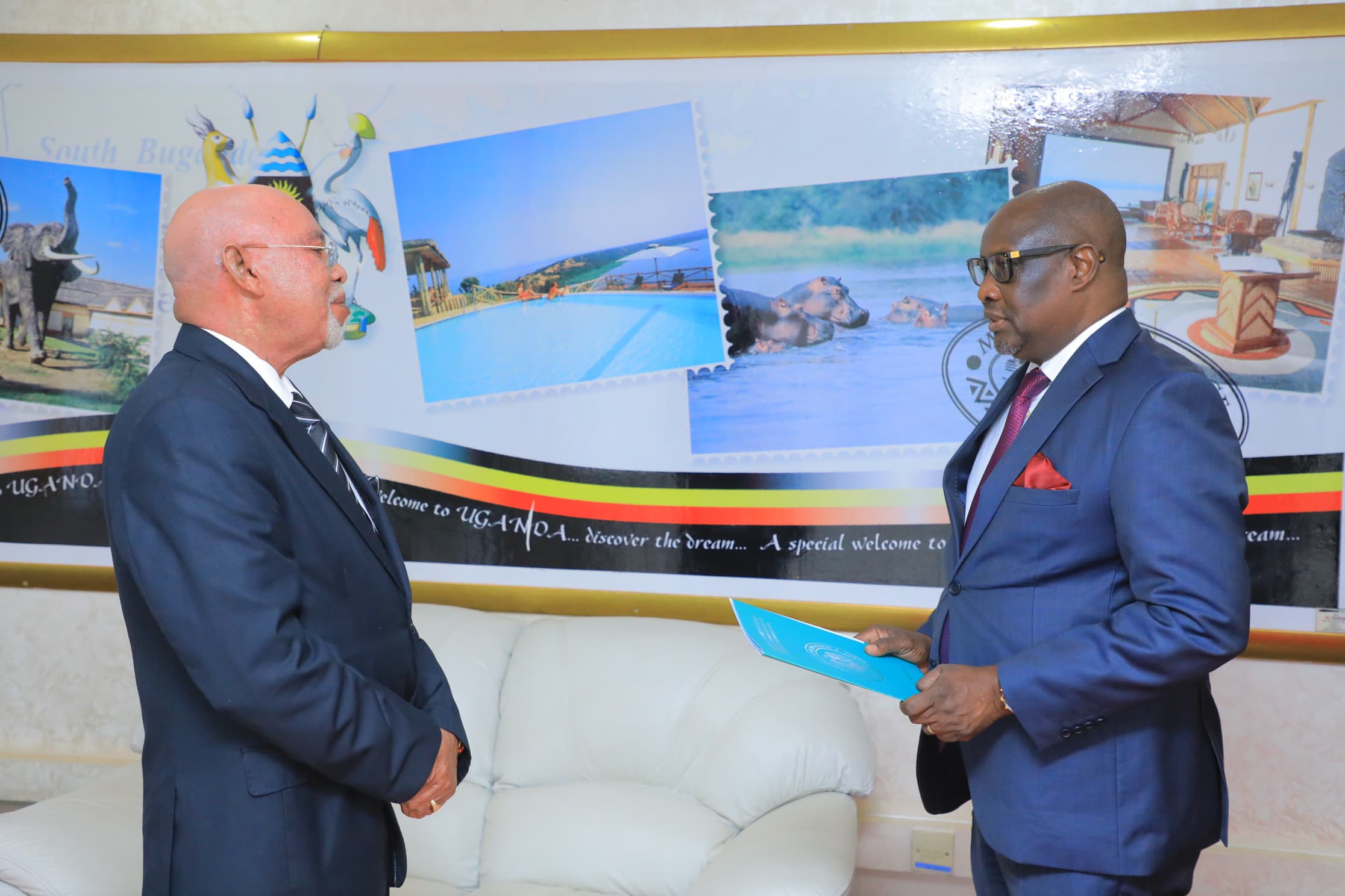  New Designate Ambassador of the Republic of South Sudan H.E Paul Molong Akaro presents copies of his credentials